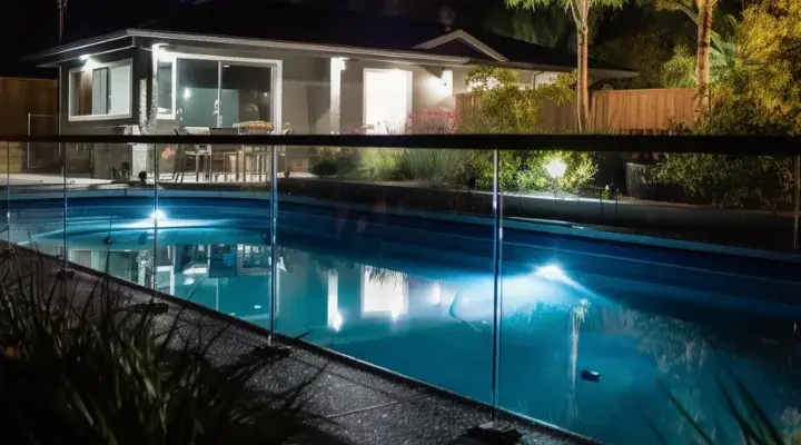 Glass pool fence taken at night time for a pool in Werribee
